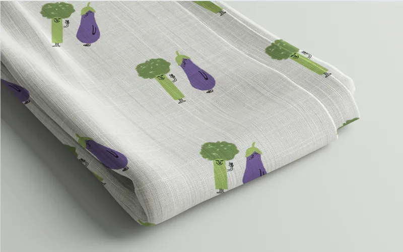 A cloth sheet designed with a veggie pattern included in the bundle